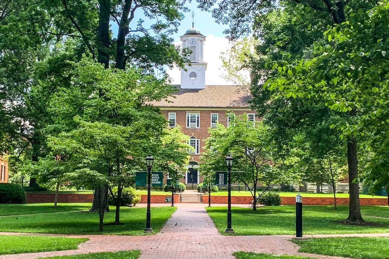 A view of Cutler Hall and College Green on a sunny day.